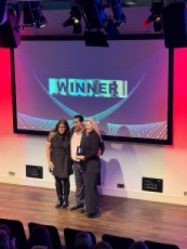 Karron Alford and Veronica Mosgrove with the Louisiana Office of Tourism accept the 2025 JRNY American Award for State of the Year.