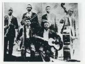 Buddy Bolden`s Band; from left to right, William Warner, William Cornish, Buddy Bolden, James Johnson, Frank Lewis (seated), Brock Mumford (seated). Courtesy of the New Orleans Jazz Club Collection. Louisiana State Museum 1978_118b_00514.